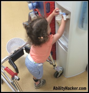 2 handed activities - filling cup at water fountain